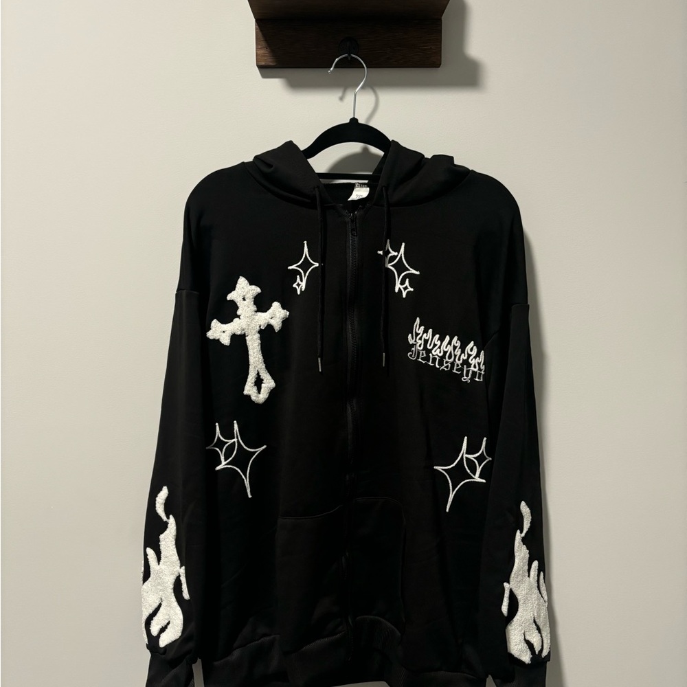 Black Hoodie with White Cross and Flame Design